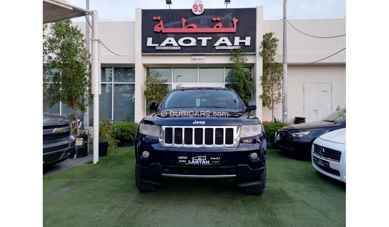 جيب جراند شيروكي موديل 2013 خليجى لون ازرق داخل زعفرانى فتحة جلد مثبت بحالة ممتازة لاتحتاج لأى مصاريف