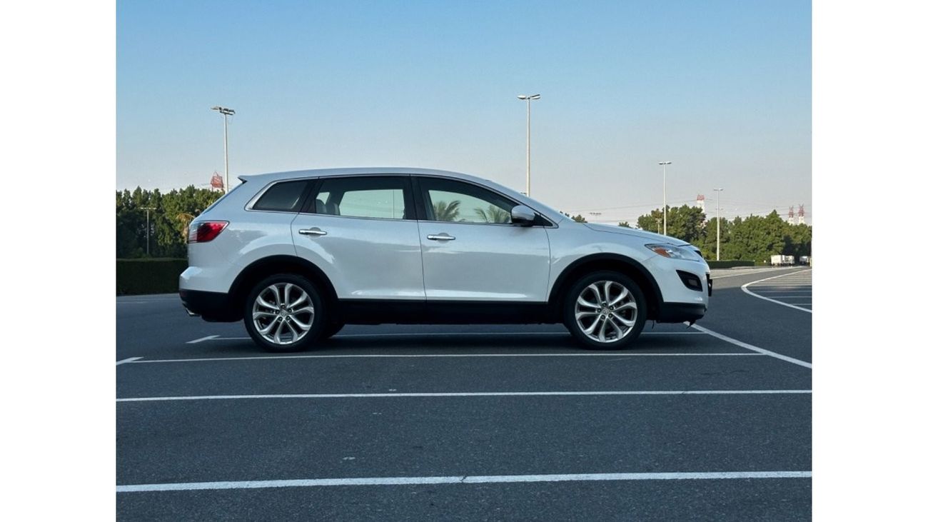 مازدا CX9 موديل 2011 خليجي فل مواصفات كراسي جلد ومثبت سرعه وتحكم كهربي كأمل ونظام صوت ممتاز وكاميرا خلفيه