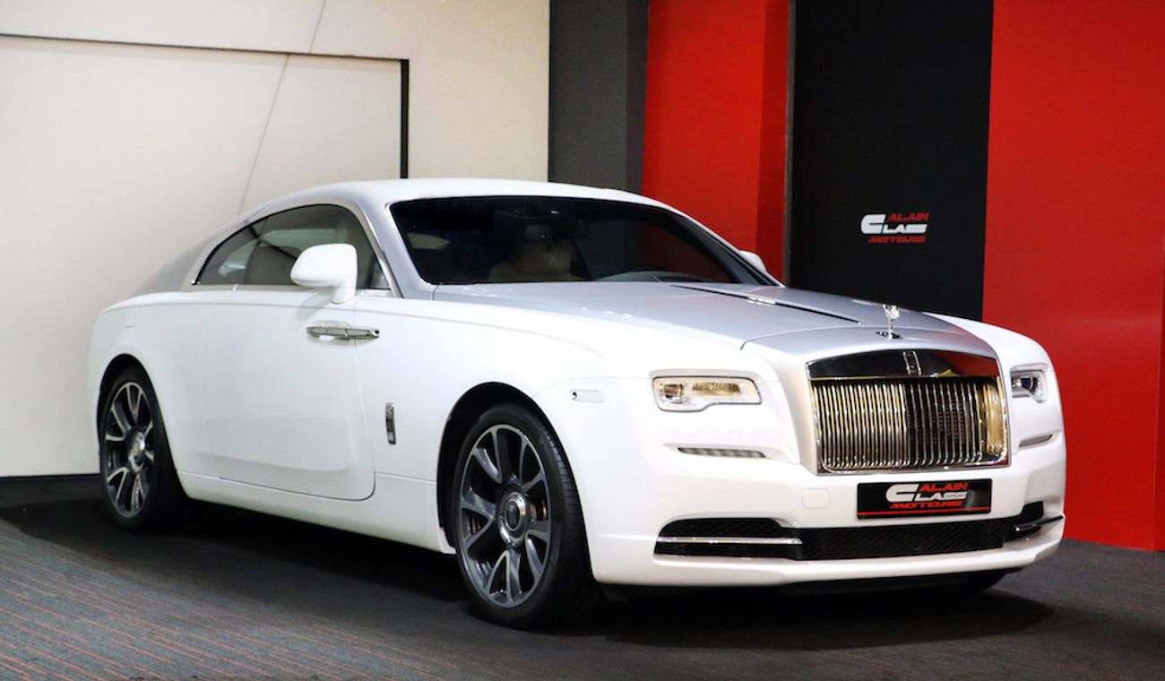 Rolls-Royce Wraith Original Color:  Brown | Silver  ( car with White Vinyl Sticker )