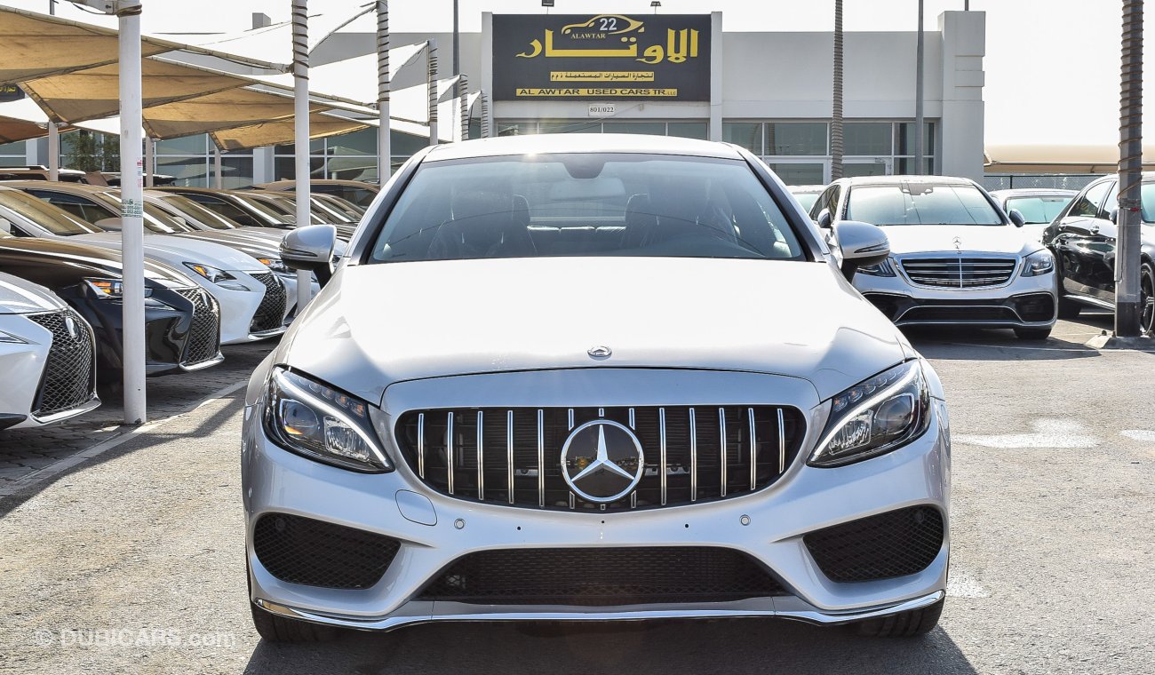 Mercedes-Benz C 300 Coupe AMG Kit، One year free comprehensive warranty in all brands.