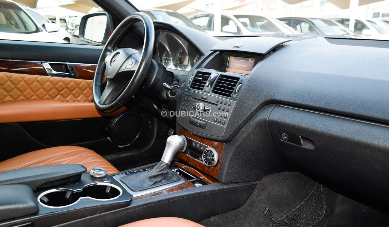 Mercedes Benz C300 C300 2009 model red color imported number one panorama leather and cruise control