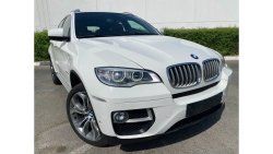 BMW X6 AED2070/month | 2014 BMW X6 Xdrive50i 4.4L UNLIMITED K.M WARRANTY.