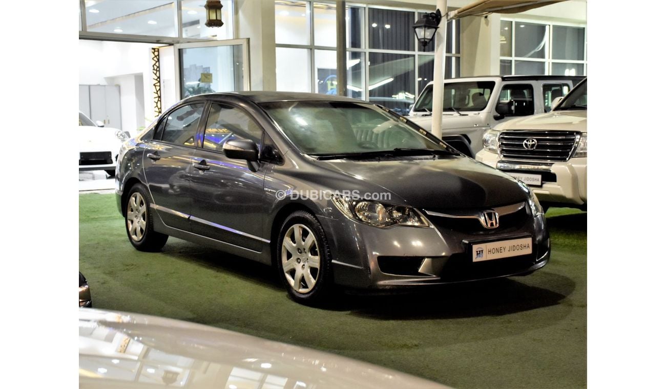 Honda Civic EXCELLENT DEAL for our Honda Civic 1.8 i-VTEC ( 2009 Model ) in Grey Color GCC Specs
