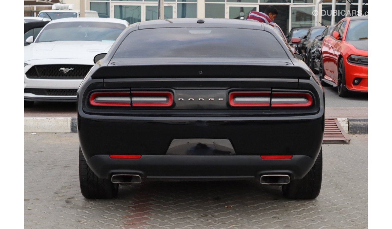 Dodge Challenger R/T make/ Dodge Challenger  model / 2017  color / black  engine size / 8 cylinder  5.7L  transmissio