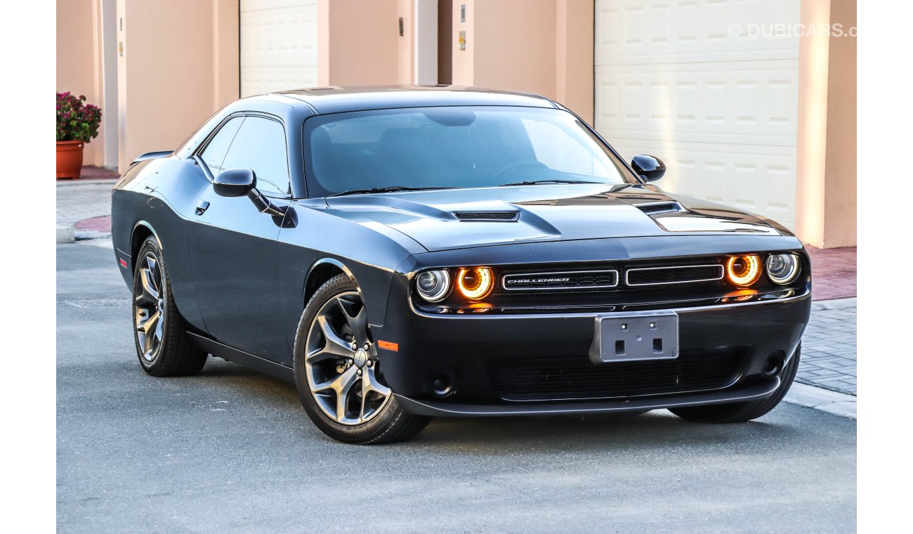 Dodge Challenger 2016 GCC under Warranty with Zero Down-Payment.