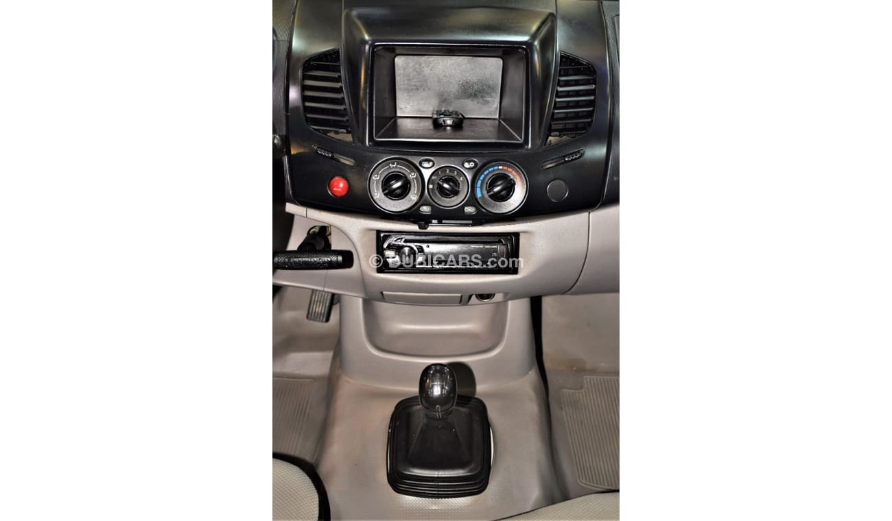 Mitsubishi L200 PERFECT FOR TRANSPORTING ITEMS! Mitsubishi L200 2013 Model!! in White Color! GCC Specs