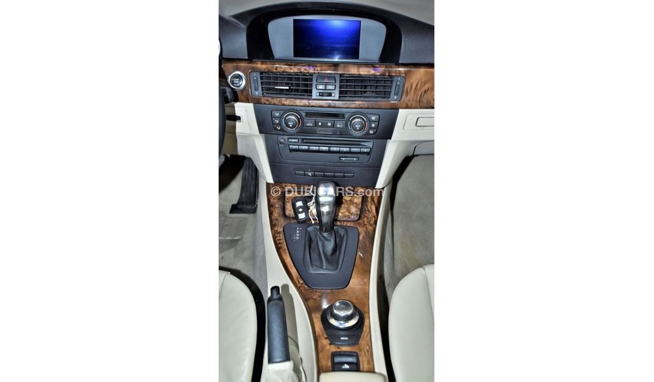 BMW 320i EXCELLENT DEAL for our BMW 320i Convertible ( 2008 Model ) in White Color GCC Specs