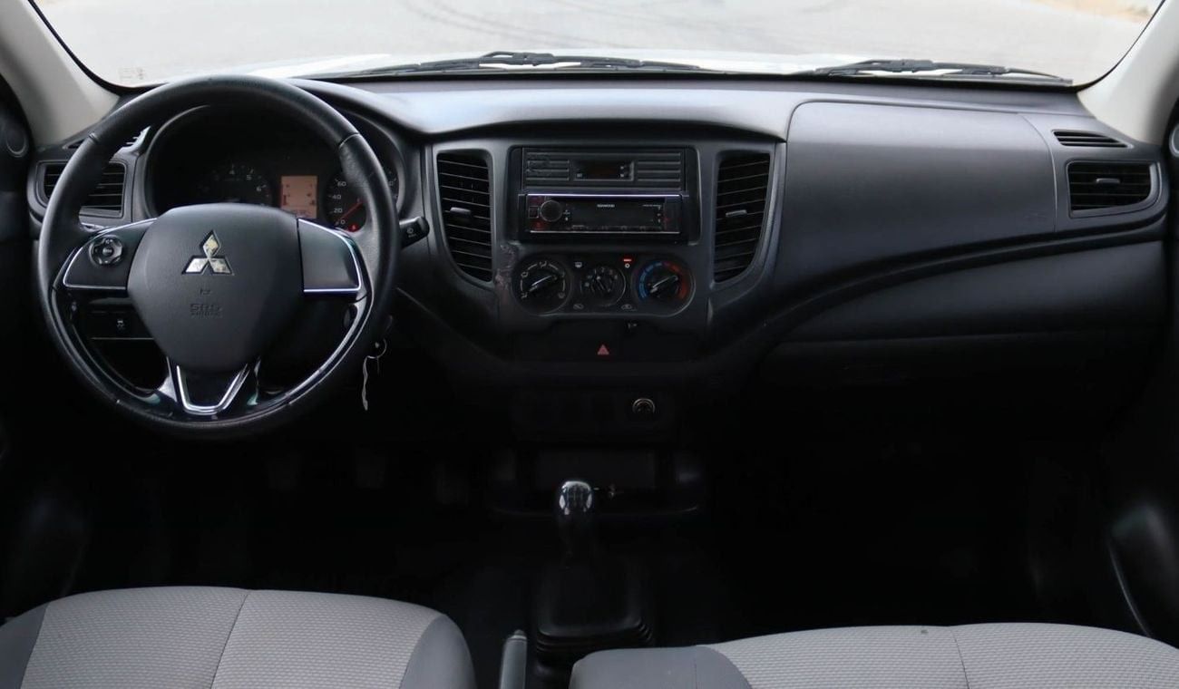 ميتسوبيشي L200 GL 2.4L (128 HP) Double Cab Utility Mitsubishi L200 2.4 L RWD 2020 GCC accident-free in excellent co