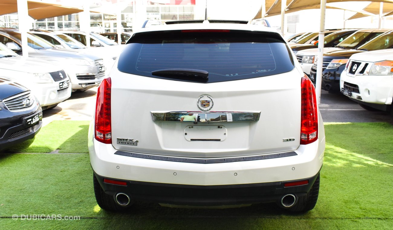 Cadillac SRX Gulf model 2015, full option, leather, panorama, cruise control, wheels, in excellent condition