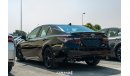 Toyota Camry XSE Hybrid Black / Red Interior