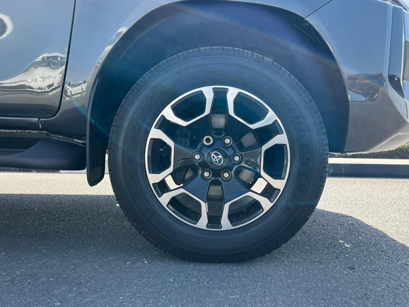 تويوتا هيلوكس The Toyota Hilux is a renowned mid-size pickup truck known for its exceptional ruggedness, reliabili