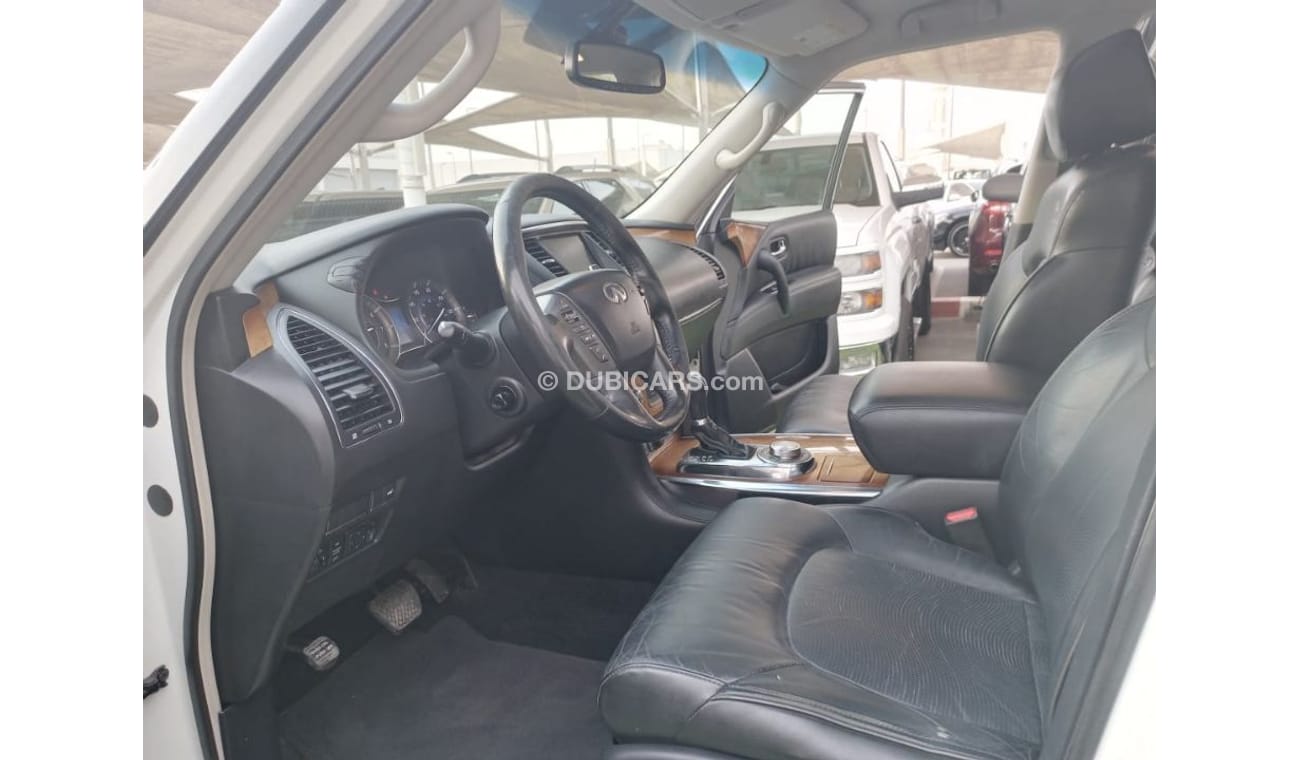 Infiniti QX56 Model 2011 imported, white color, leather opening, alloy wheels, sensors, speed stabilizer, in excel