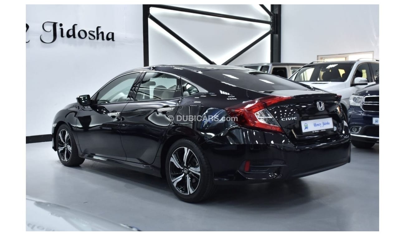Honda Civic EXCELLENT DEAL for our Honda Civic ( 2019 Model ) in Dark Violet Color GCC Specs