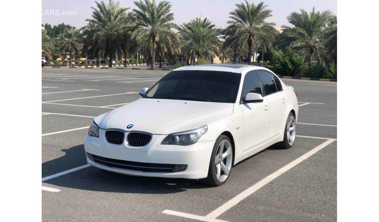 BMW 523i Model 2010 GCC car perfect condition inside and outside full option sun roof leather seats back came