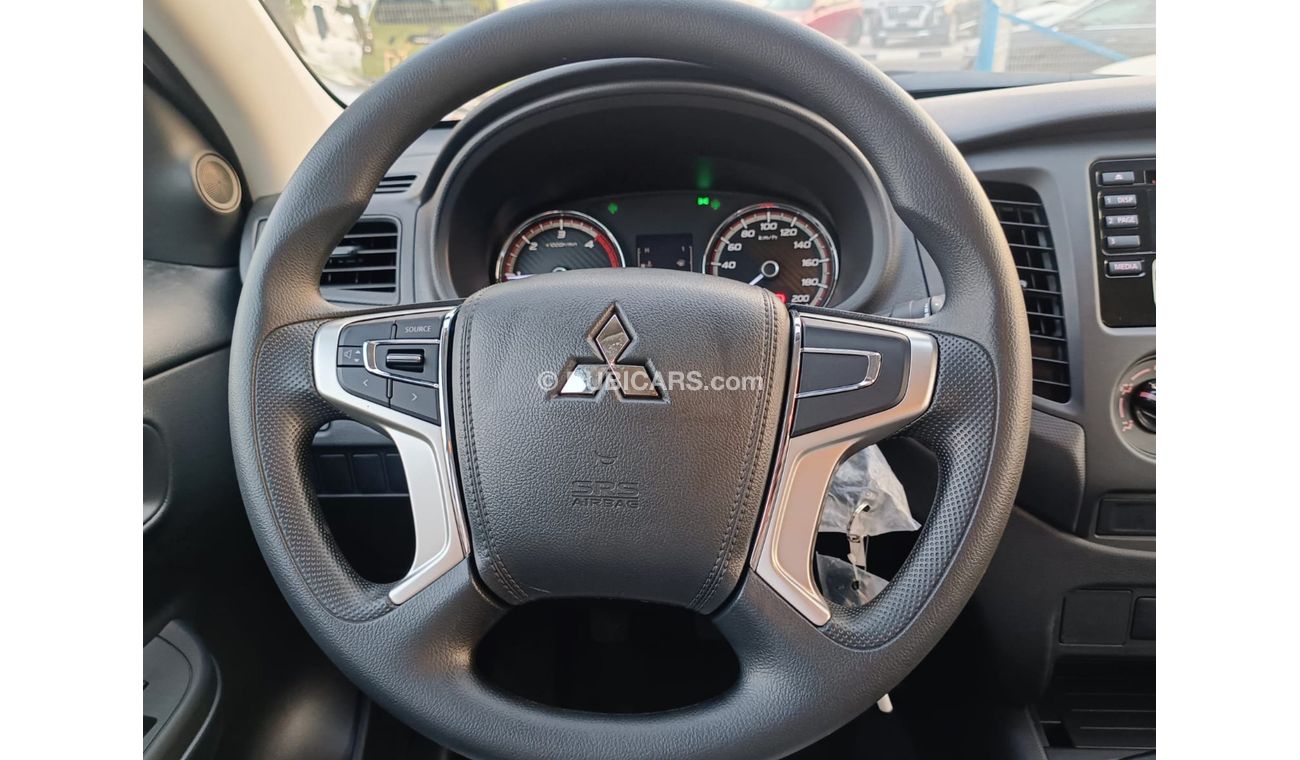 Mitsubishi L200 GLX 2.5L Diesel / M/T / 4WD / Black Rims / Steering Vol Control (Code # L2DDB)