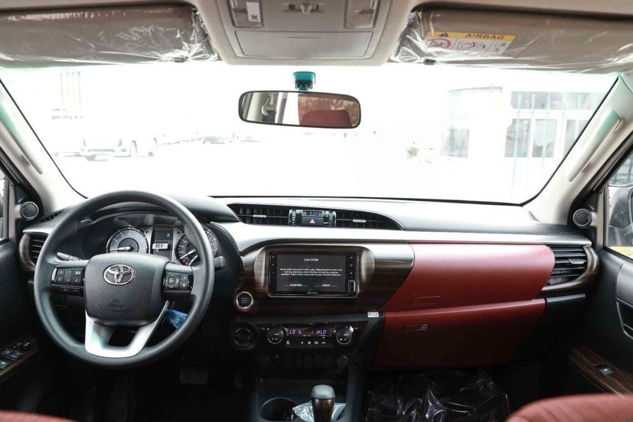 تويوتا هيلوكس 2025 TOYOTA HILUX HI 2.7 - PLATINUM WHITE PEARL inside MAROON | Export Only