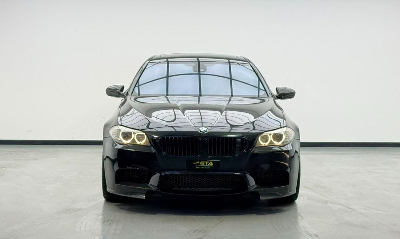 BMW M5 INDIVIDUAL 2013 BMW M5, Stage 2 Tuned, Carbon Fiber Exterior, Fully Loaded, Excellent Condition, GCC