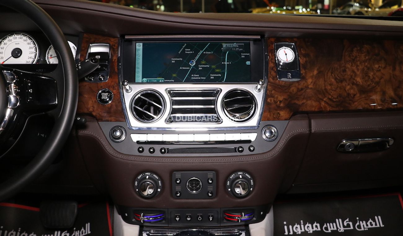 Rolls-Royce Wraith Original Color:  Brown | Silver  ( car with White Vinyl Sticker )