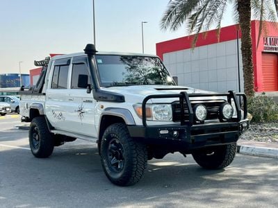تويوتا لاند كروزر بيك آب The 2019 Land Cruiser Pickup (often the 70 Series) is a rugged, utilitarian truck known for legendar