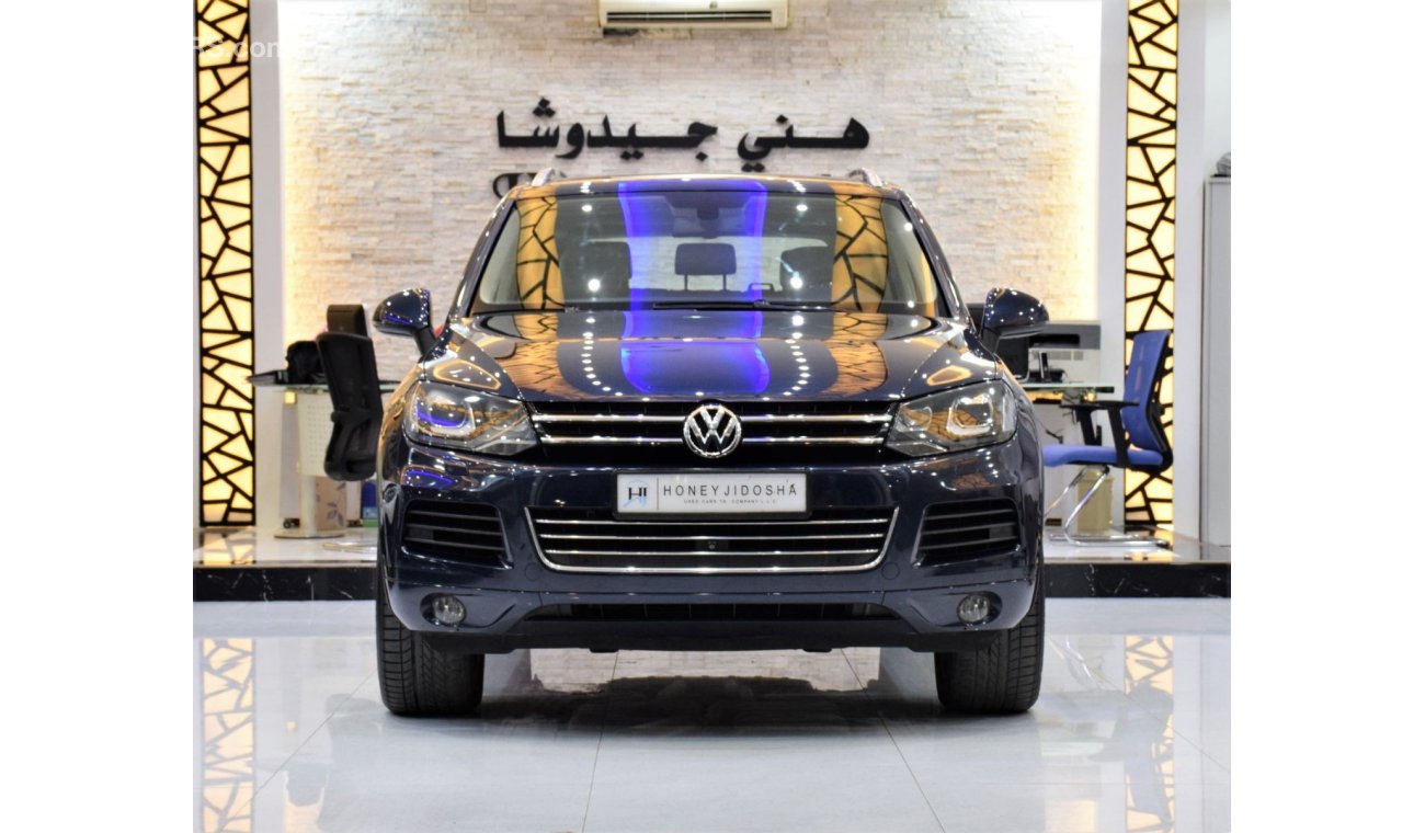 Volkswagen Touareg SEL EXCELLENT DEAL for our Volkswagen Touareg ( 2015 Model! ) in Blue Color! GCC Specs