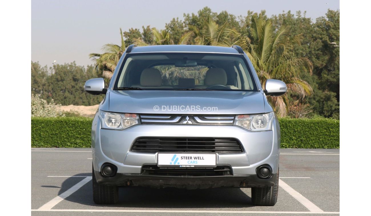 ميتسوبيشي آوتلاندر 2014 | MITSUBISHI OUTLANDER - 7 SEATER CAPACITY PETROL A/T WITH GCC SPECS AND EXCELLENT CONDITION