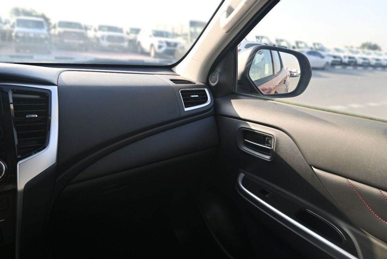 ميتسوبيشي L200 ميتسوبيشي L200 ديزل فل أوبتيون أوتوماتيك 2.4 لتر برتقالي من الخارج أسود من الداخل