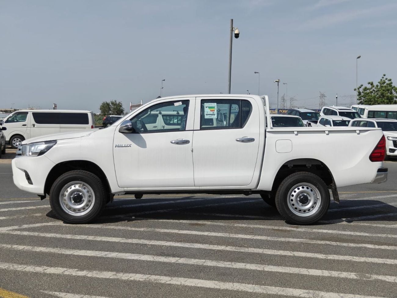 تويوتا هيلوكس 2026 Toyota Hilux white/red 2.4L diesel manual GCC spec mid option