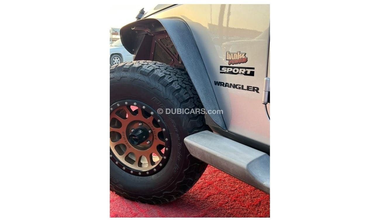 جيب رانجلر جيب رانجلر سبورت موديل : 2013 الممشي : 135,000 كم السعر : 49.000 درهم  قير عادي V6/3.6L  مواصفات خلي