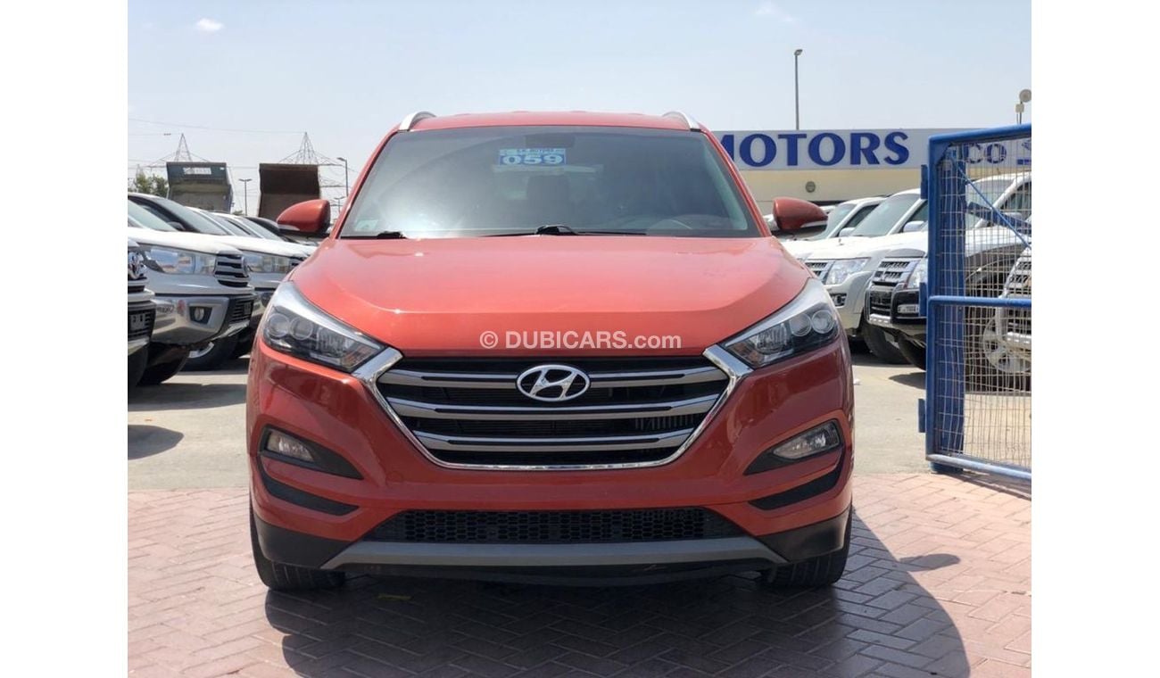 Hyundai Tucson LIMITED 1.6L TURBO-DVD-REAR CAMERA-2 POWER SEATS-19" ALLOY RIMS-LEATHER SEATS-NAVIGATION, LOT-603