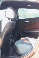 دودج تشارجر Unleash pure muscle with this Dodge Charger 2017, upgraded with an SRT body kit for an aggressive, h