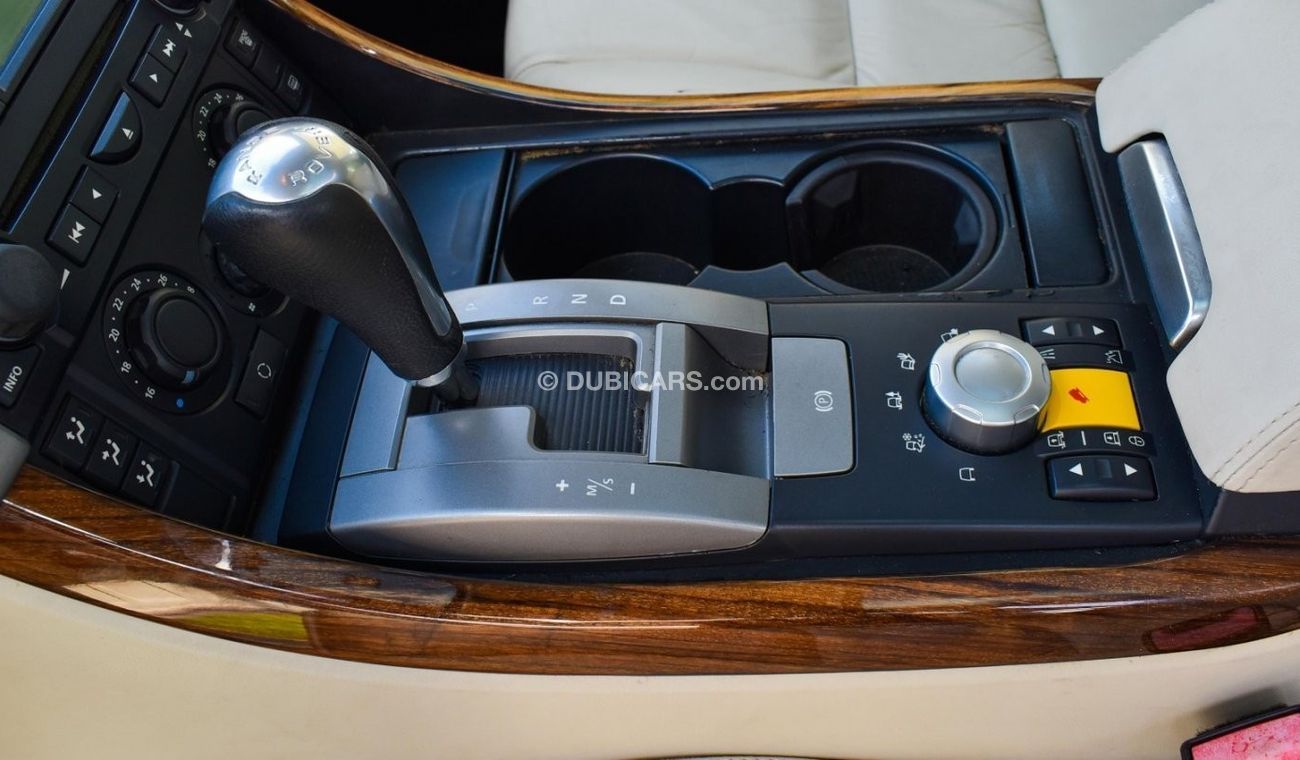 Land Rover Range Rover Sport 2009 Gulf model, white color, beige interior, one number, leather hatch, fixed control wheels, rear