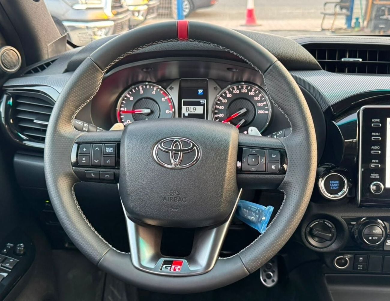 تويوتا هيلوكس GR SPORT || 2.8L DIESEL V4 4WD | DRIVER PWR SEAT WITH LEATHER | 360*CAMERA | TRIP TRONIC (CODE # HDG