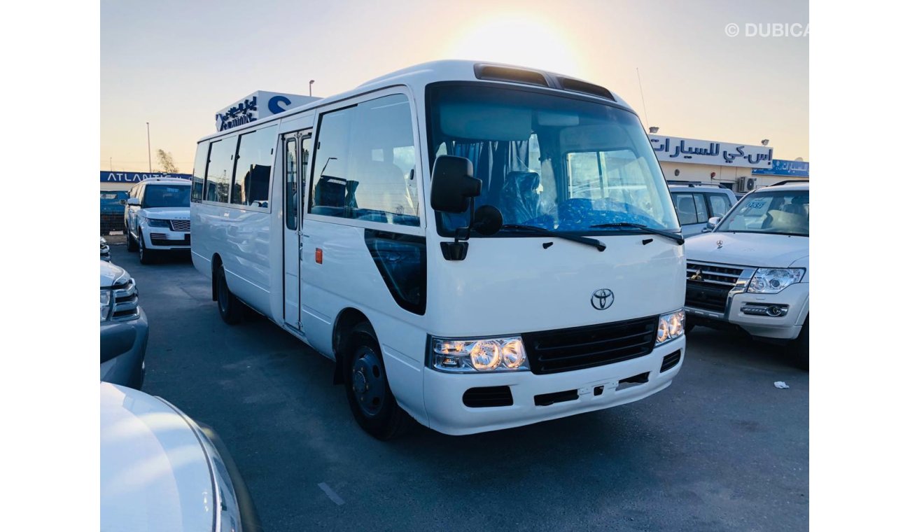 Toyota Coaster 4.2L Diesel, DVD + Rear Camera, Manual, MP3 Interface, DVD, CD Player, Tuner Radio, (LOT # TCB16)