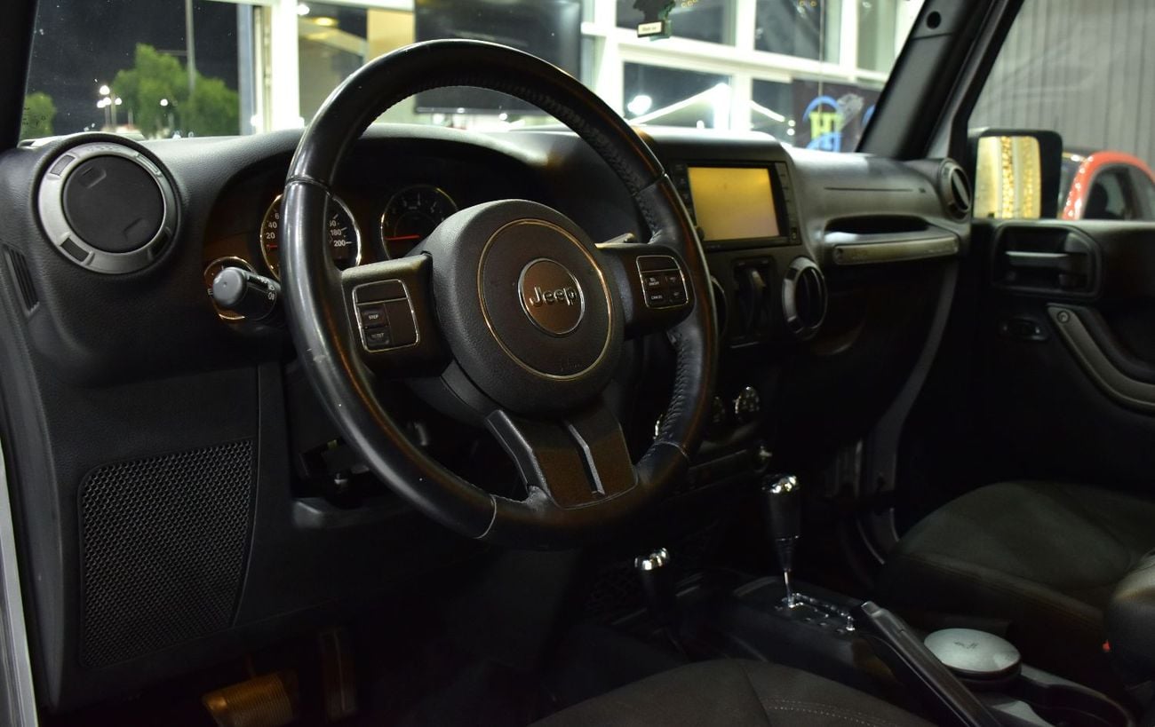 Jeep Wrangler EXCELLENT DEAL for our Jeep Wrangler Sport ( 2016 Model ) in Silver Color GCC Specs