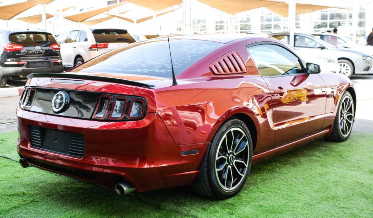 Ford Mustang Coupe, red color inside black, in excellent condition, you do not need any expenses