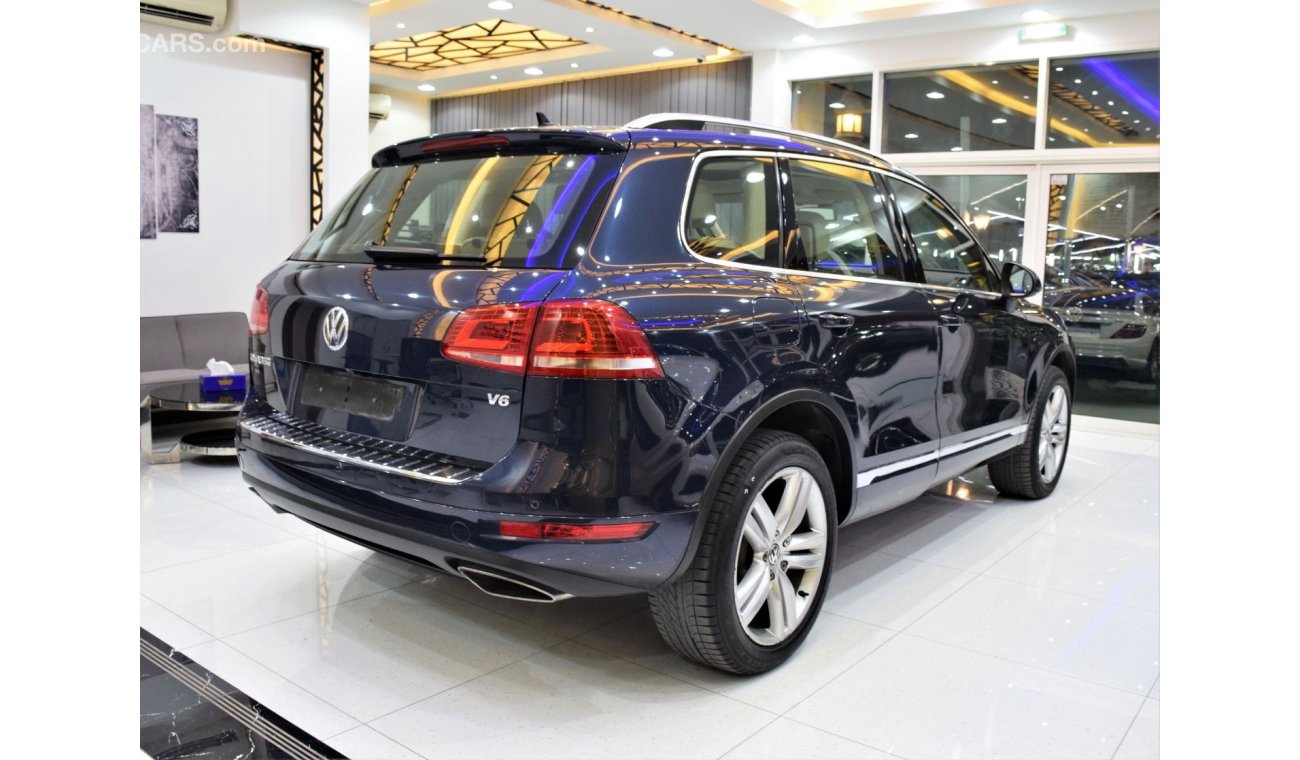 Volkswagen Touareg SEL EXCELLENT DEAL for our Volkswagen Touareg ( 2015 Model! ) in Blue Color! GCC Specs