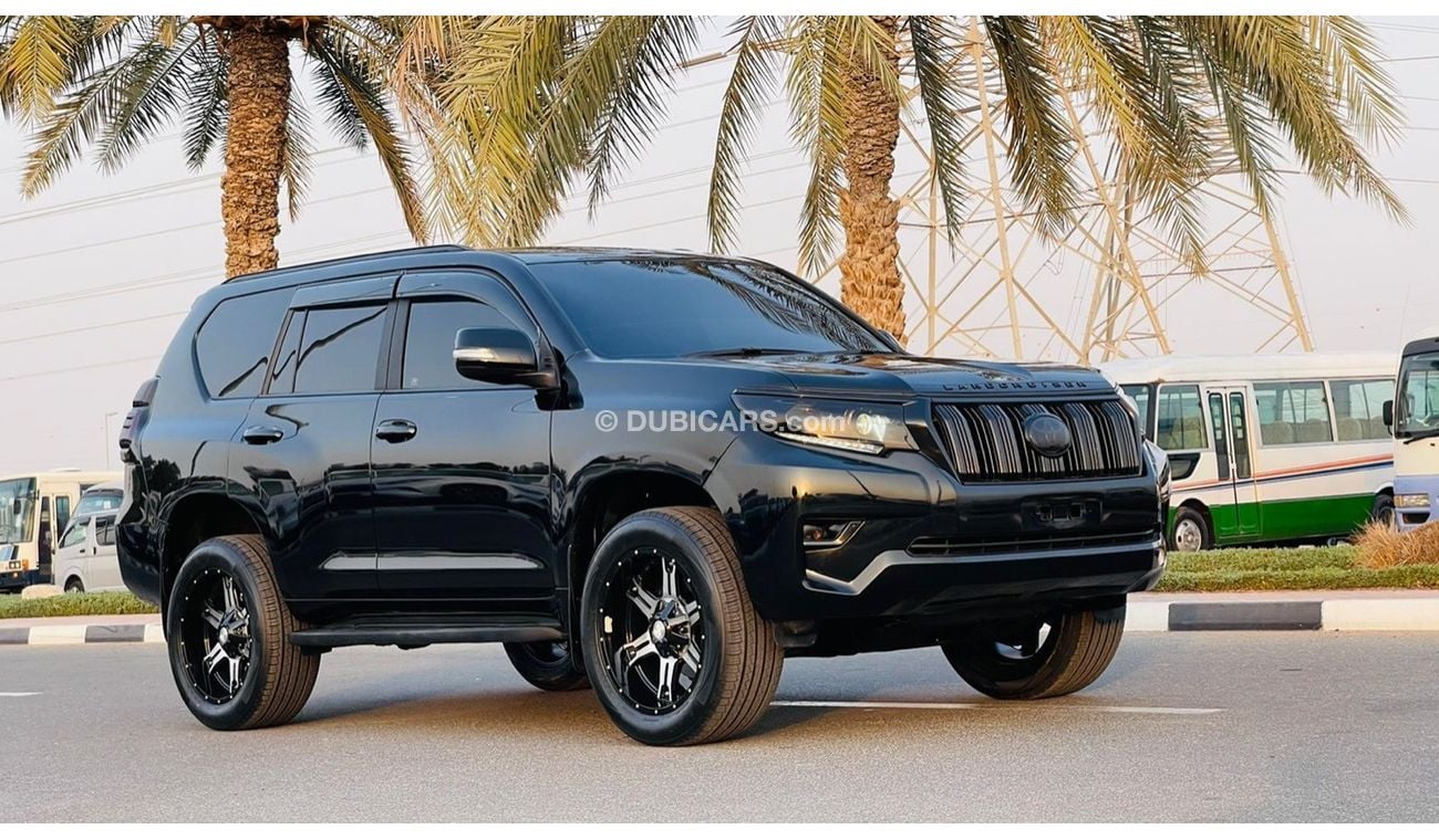 تويوتا برادو 2011 Fully Modified 'Black Beauty' 2.7L Petrol 4WD AT Push Start Leather Electric 7 Seats Tesla Scre