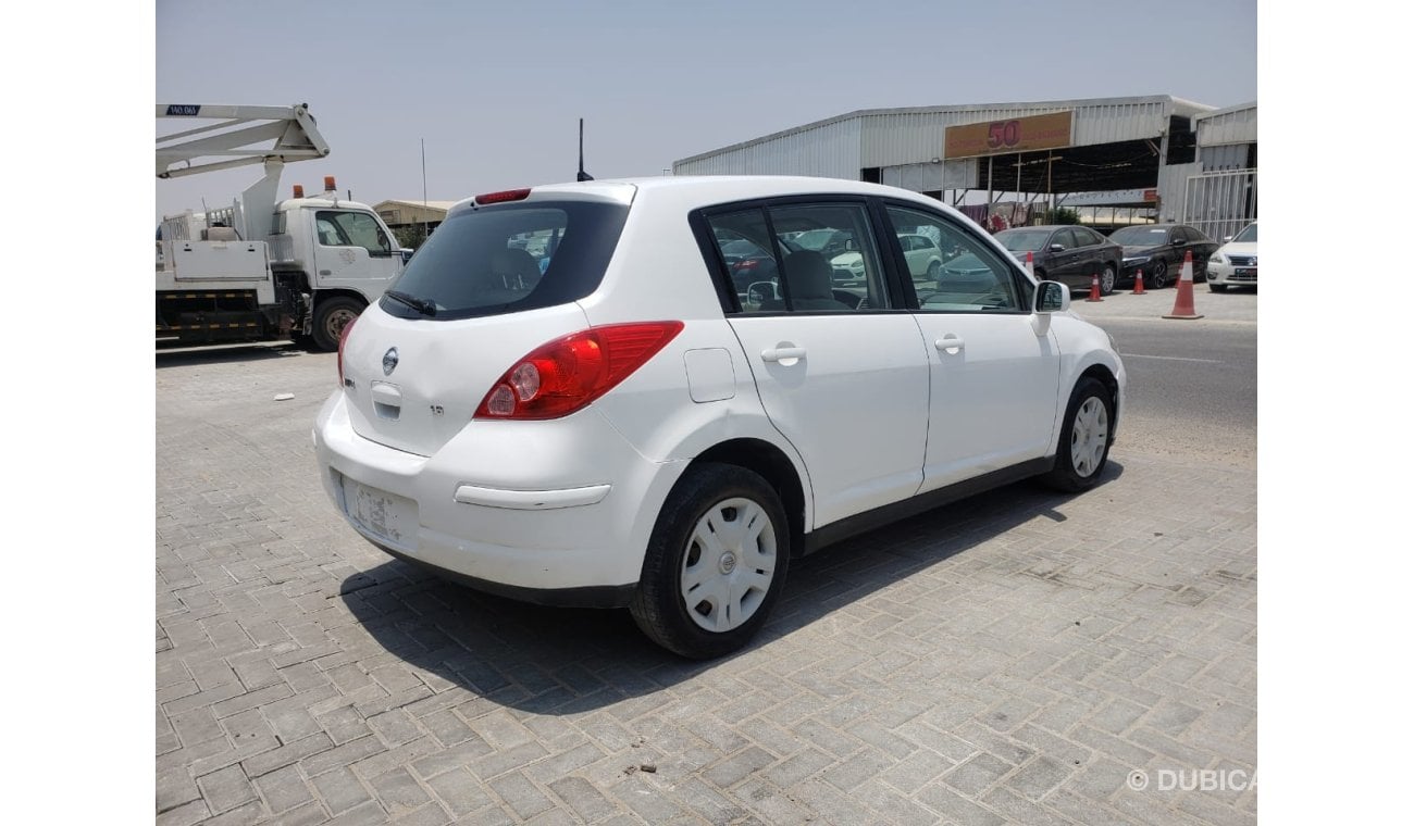 Nissan Tiida LOT: 135 AUCTION DATE: 7.8.21