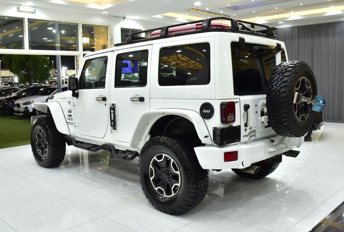 Jeep Wrangler EXCELLENT DEAL for our Jeep Wrangler Unlimited Sport ( 2014 Model ) in White Color GCC Specs