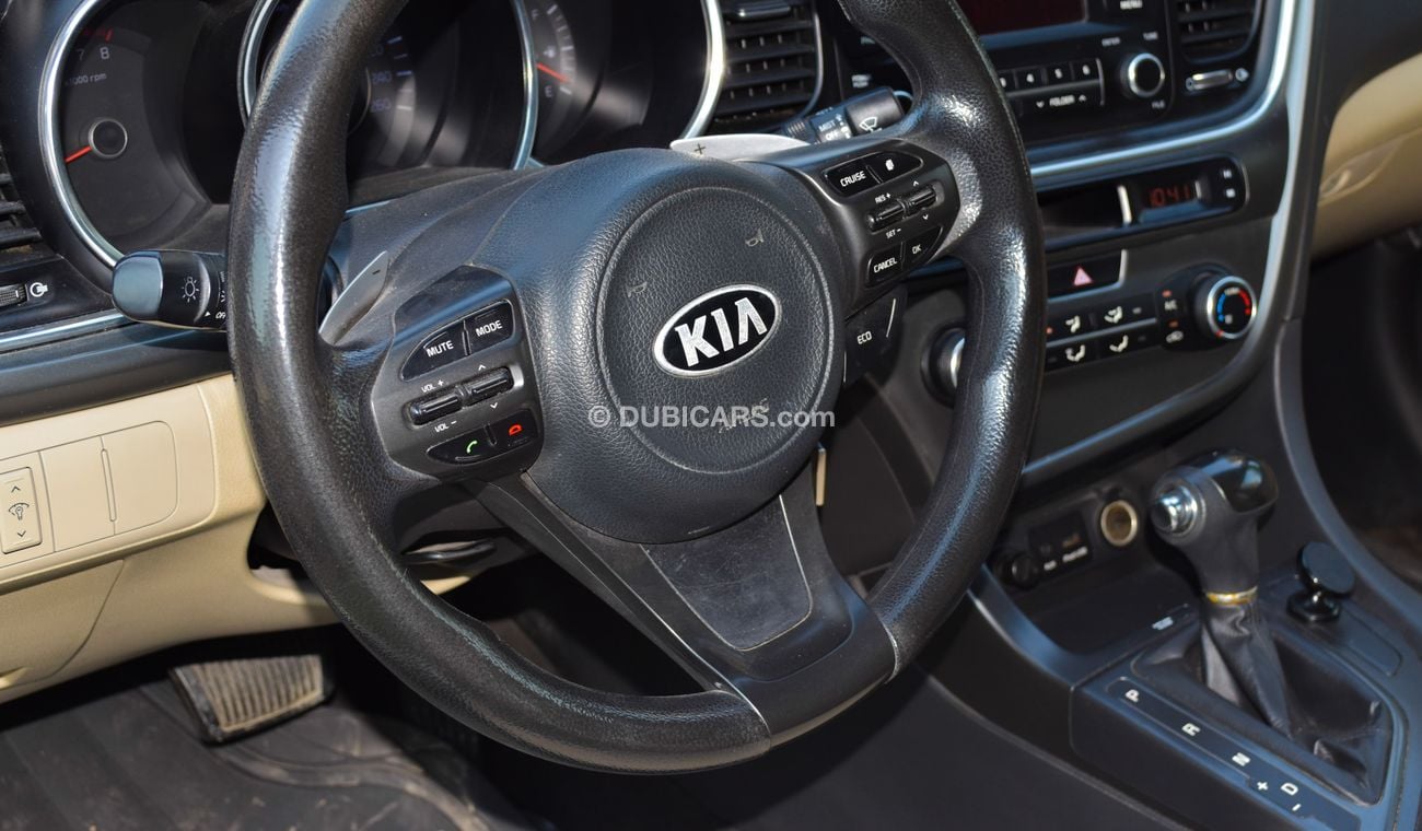 كيا أوبتيما خليجي 2014 لون ابيض داخل بيج رقم 2 رنجات ومثبت سرعه تحكم رنجات حساسات  بحاله ممتازة