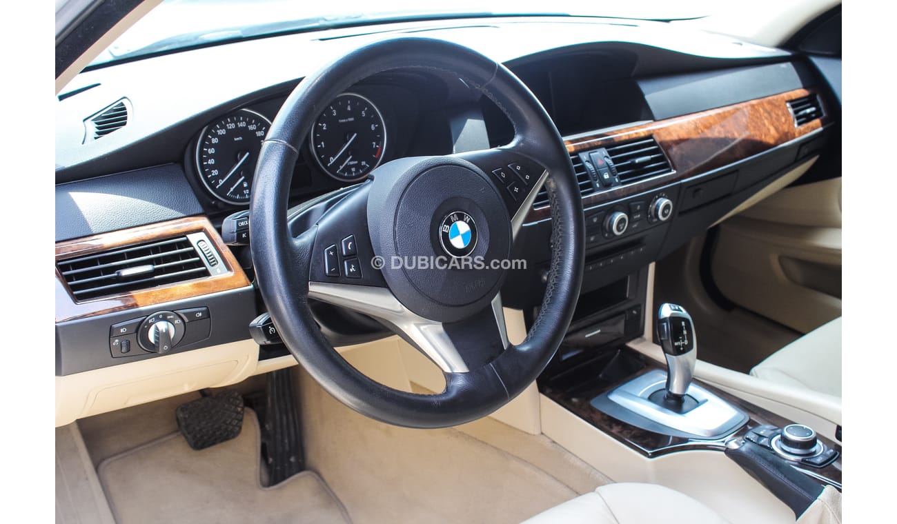 BMW 530i 2009 model Gulf specs Full options  sunroof DVD leather interiors