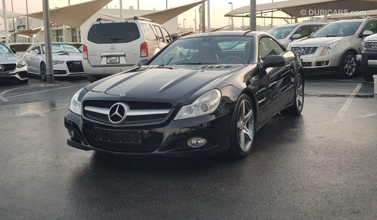 مرسيدس بنز SL 350 موديل 2009 خليجي فل اوبشن شيتري تشيكات وكاله عداد قليل مثبت سرعه وكاميرا خلفيه وكراسي الكترونيه وبلو