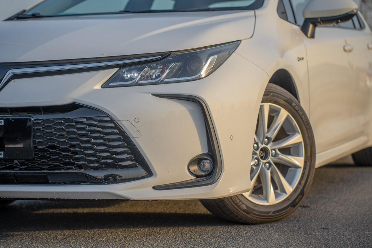 Toyota Corolla تويوتا كورولا ELITE HYBRID / 1.8L V4 PETROL / PUSH START / DVD+ CAMERA / SUNROOF (CODE # HYBRID ELIT