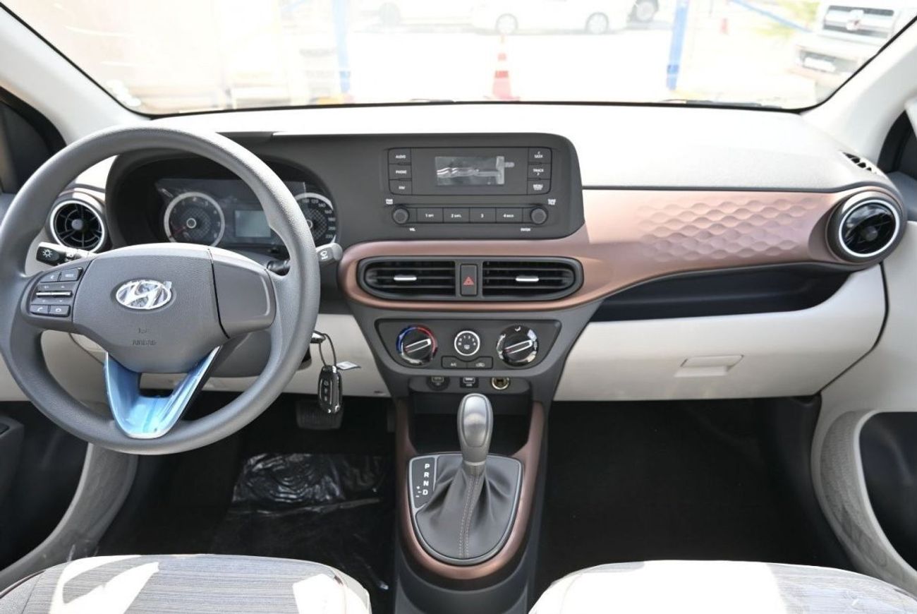 هيونداي جراند i10 هيونداي جراند آي 10 سعة 1.2 لتر بنزين سيدان دفع أمامي 4 أبواب لون رمادي موديل 2023