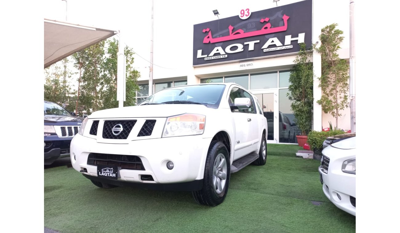 Nissan Armada Gulf model 2009  SE paint agency number one slot control unit in excellent condition