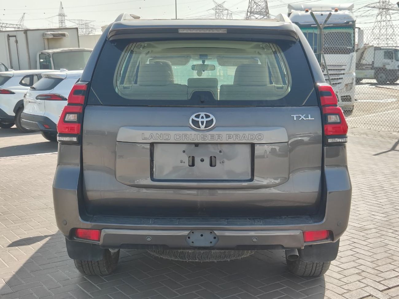 تويوتا برادو 2023 Toyota Prado TXL Spare-Down 7-Seater 4.0L V6 Petrol A/T 4WD Export Only