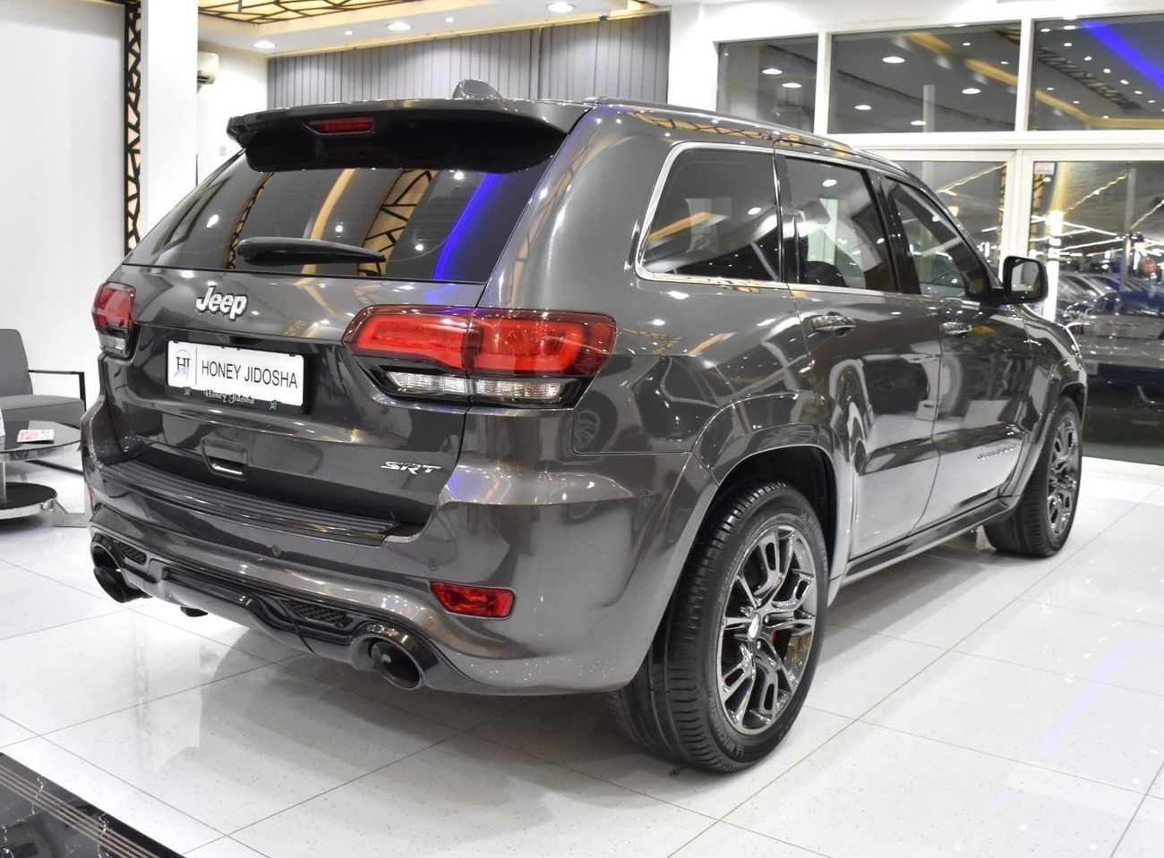 Jeep Grand Cherokee EXCELLENT DEAL for our Jeep Grand Cherokee SRT ( 2015 Model ) in Grey Color GCC Specs