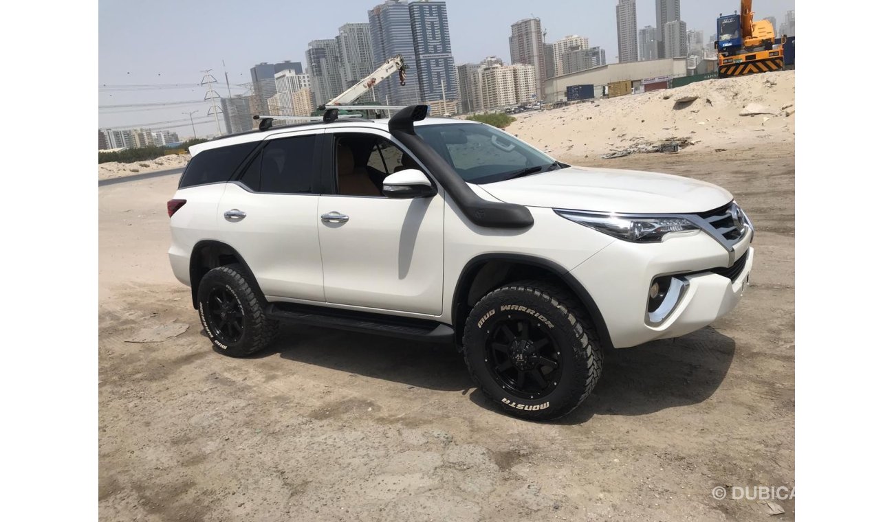 Toyota Fortuner diesel white color 2015 model full option 7 seats automatic 2.8L