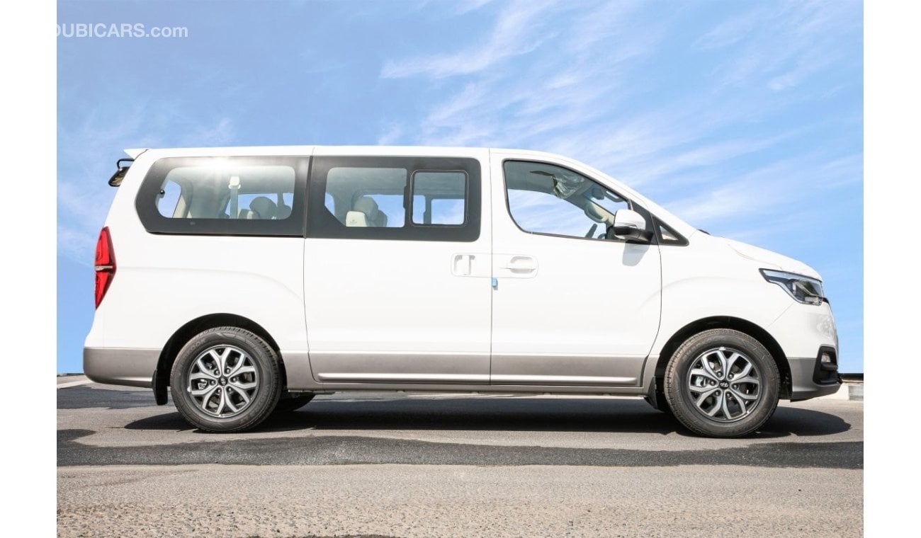 هيونداي H-1 9 Seater 2.4L Petrol M/T with Rear Parking Sensors , Auto A/C and Steering Controls