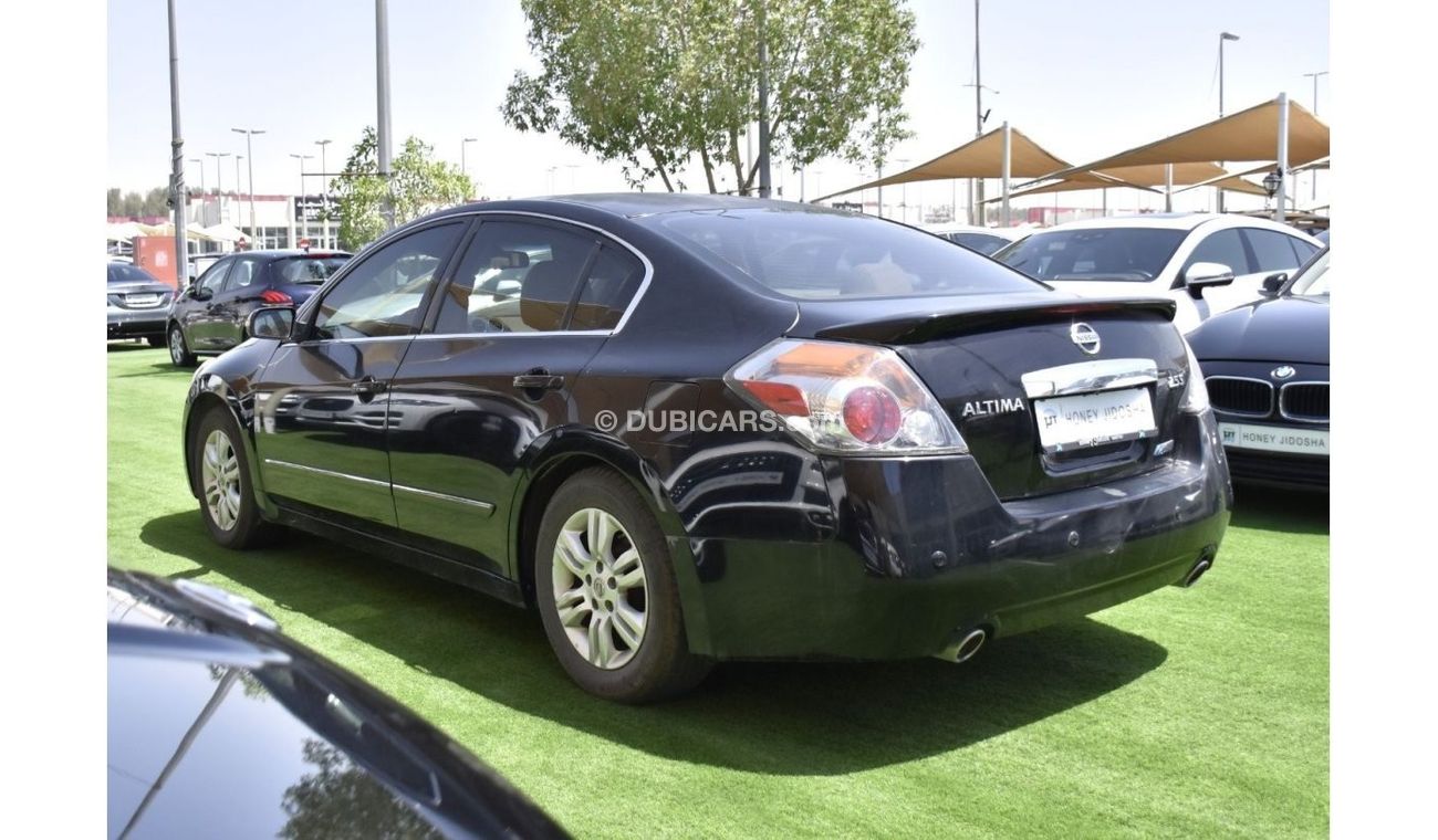 Nissan Altima EXCELLENT DEAL for our Nissan Altima 2.5 S ( 2012 Model ) in Black Color GCC Specs